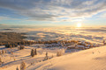 Blick auf das verschneite Skihotel Feuerberg im Winterurlaub in Kärnten