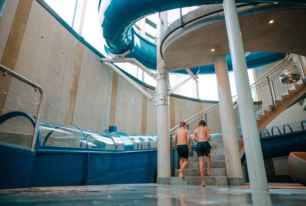 2 boys at a water slope